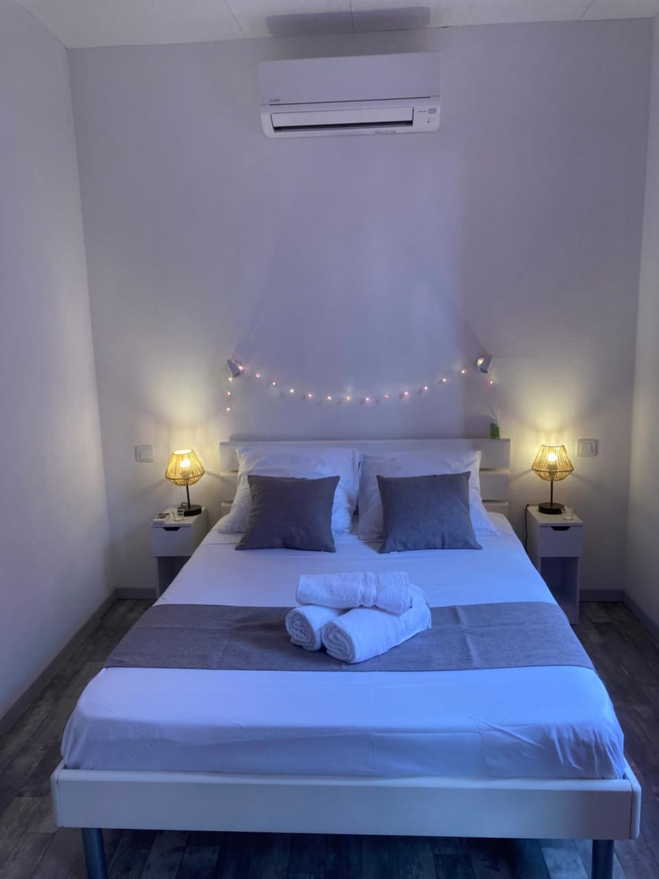 Bed, Photo of the whole room, Bedroom, towels, air conditioner