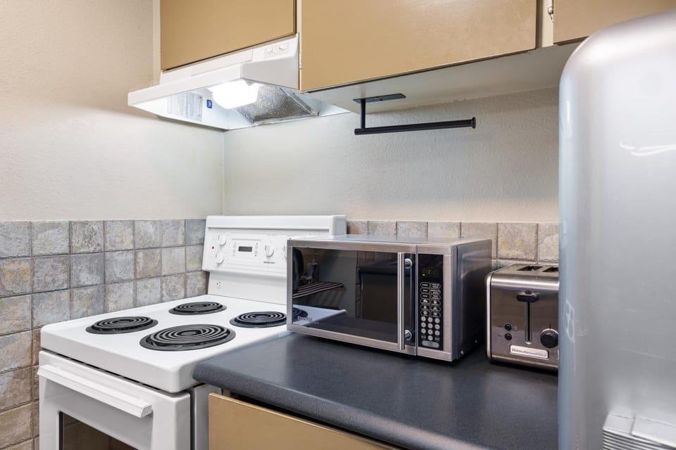 Kitchen or kitchenette, oven, stove, toaster