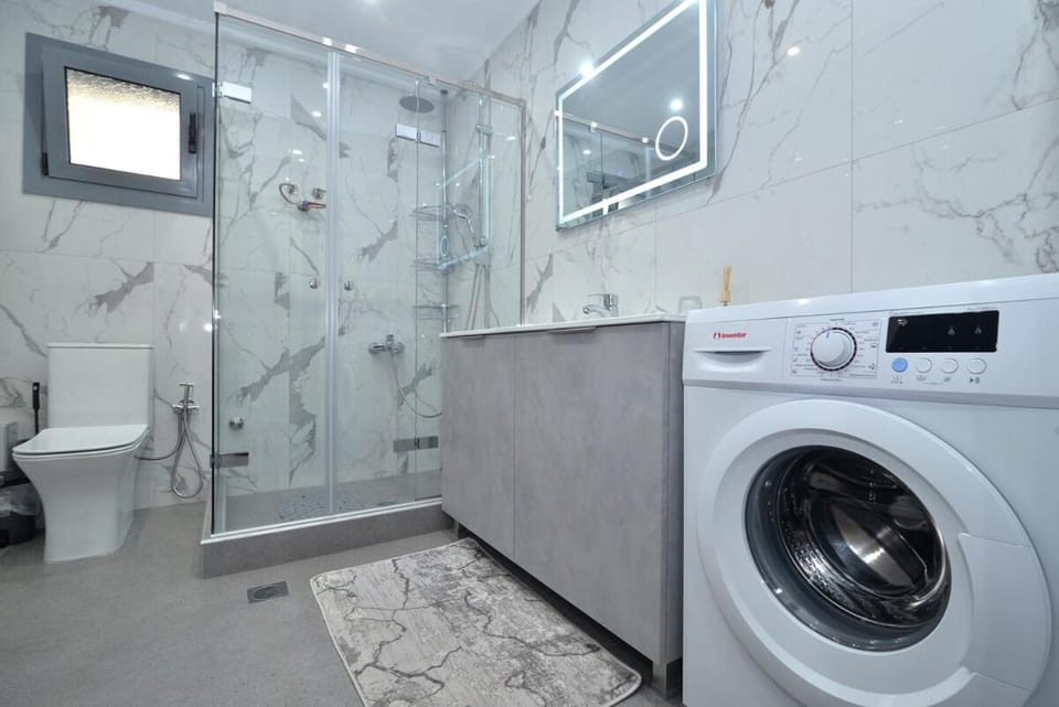 Shower, Toilet, Bathroom, hair dryier, washing machine