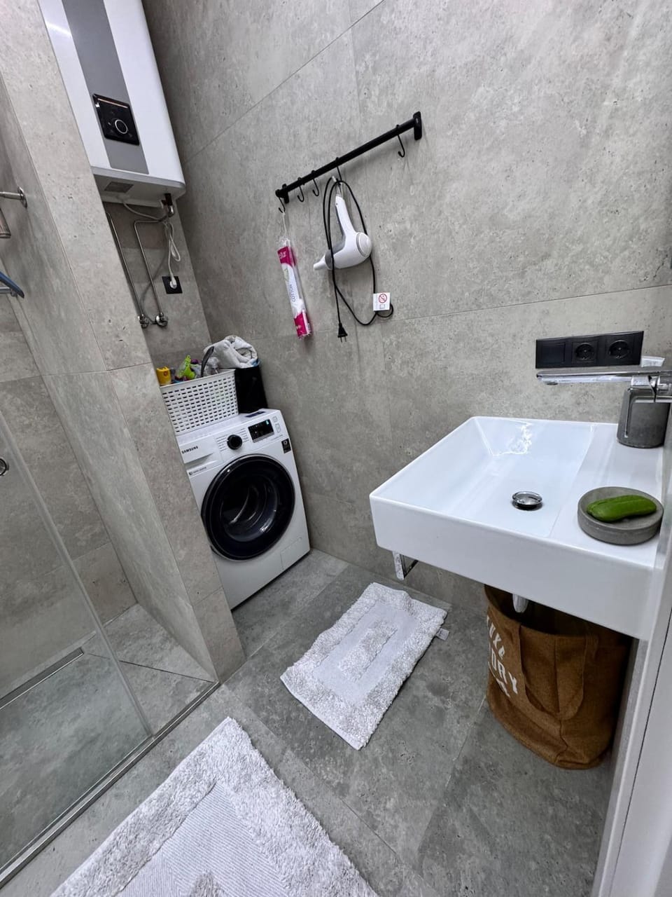 Shower, Toilet, towels, washing machine, dryer