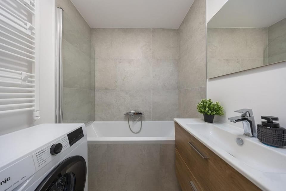 Kitchen or kitchenette, dishwasher, washing machine, dryer