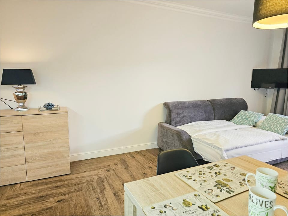 Bed, Living room, Seating area