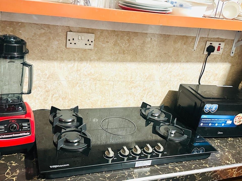 Kitchen or kitchenette, stove