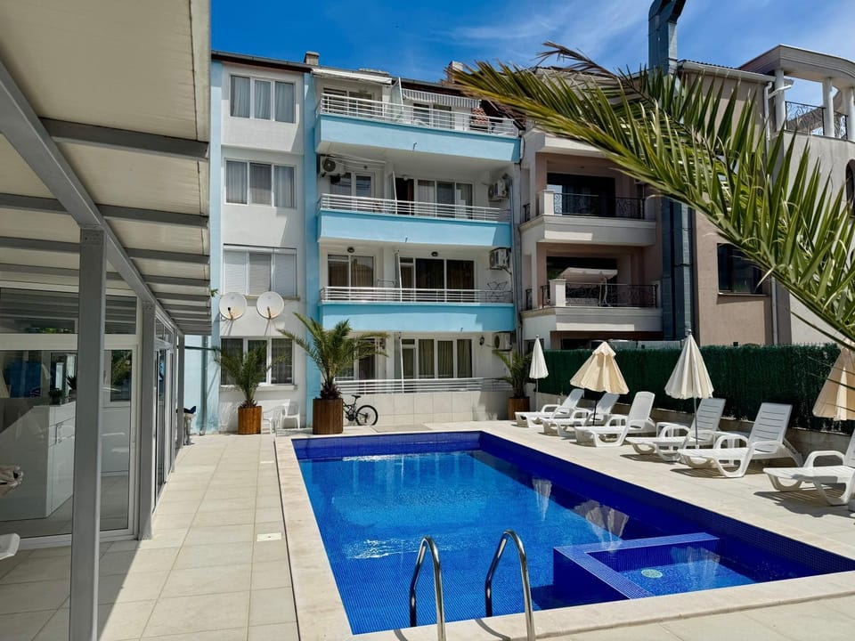 Property building, View (from property/room), Pool view, Swimming pool, sunbed