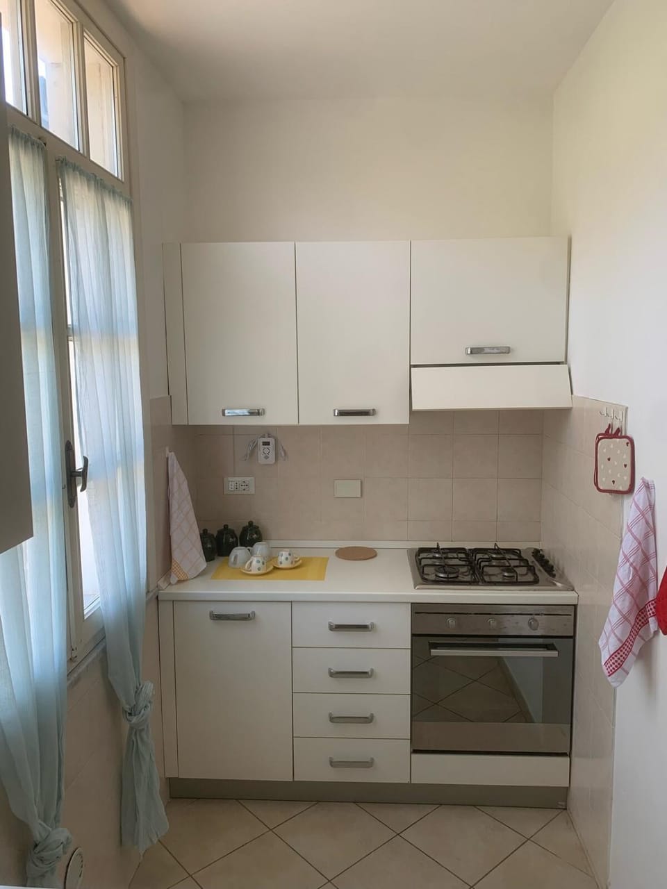 Kitchen or kitchenette, stove