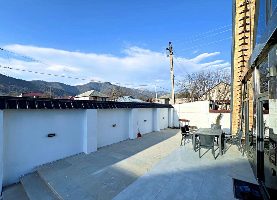 Property building, Patio, Day, Natural landscape, View (from property/room), Balcony/Terrace, Dining area, Mountain view