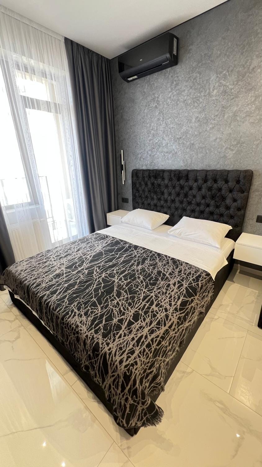 Bed, air conditioner