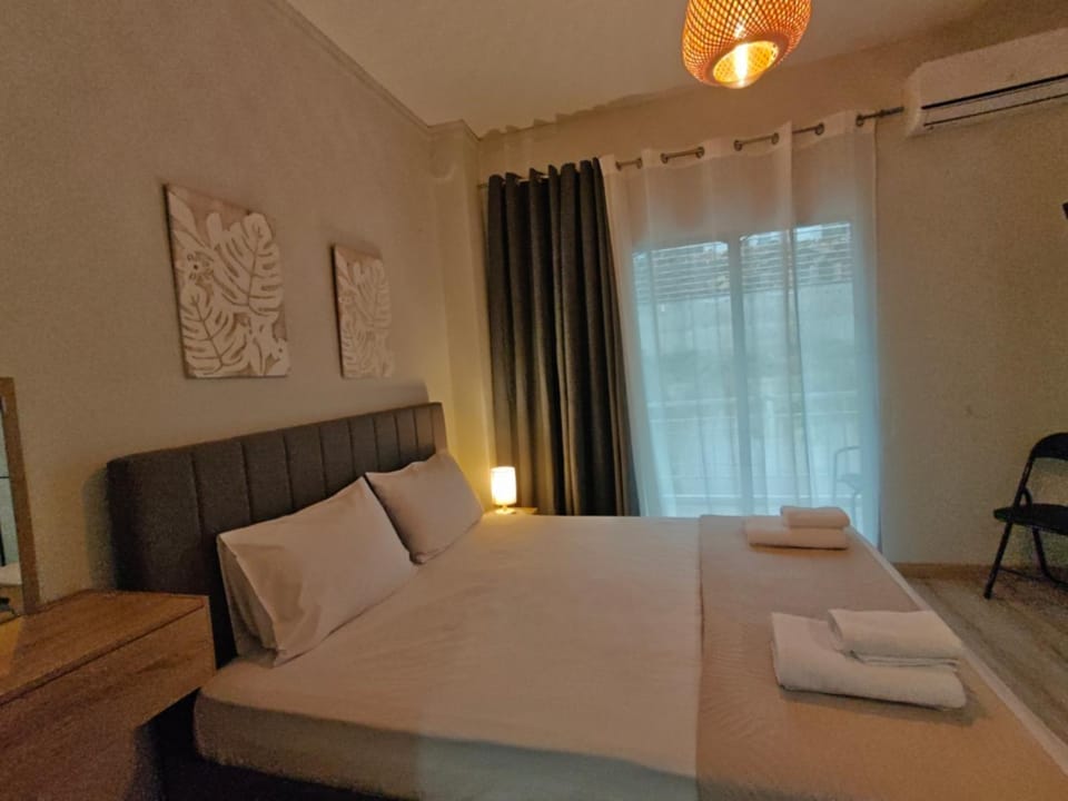 Bed, Photo of the whole room, Bedroom, towels, air conditioner