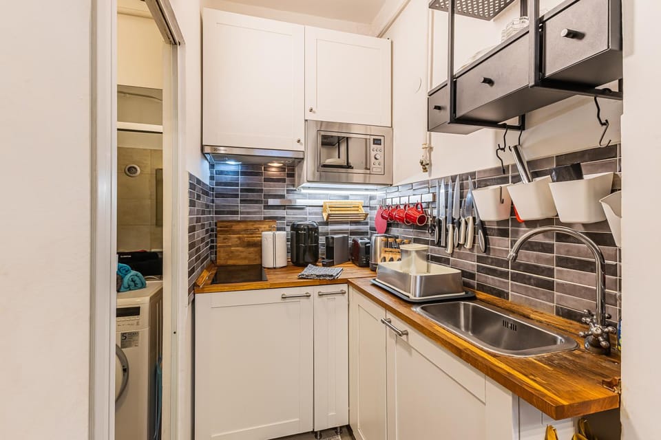 Kitchen or kitchenette, microwave, oven, stove, toaster