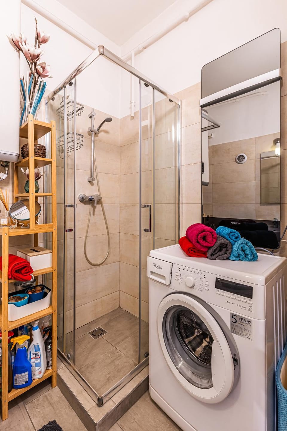 Shower, Bathroom, hair dryier, towels, washing machine