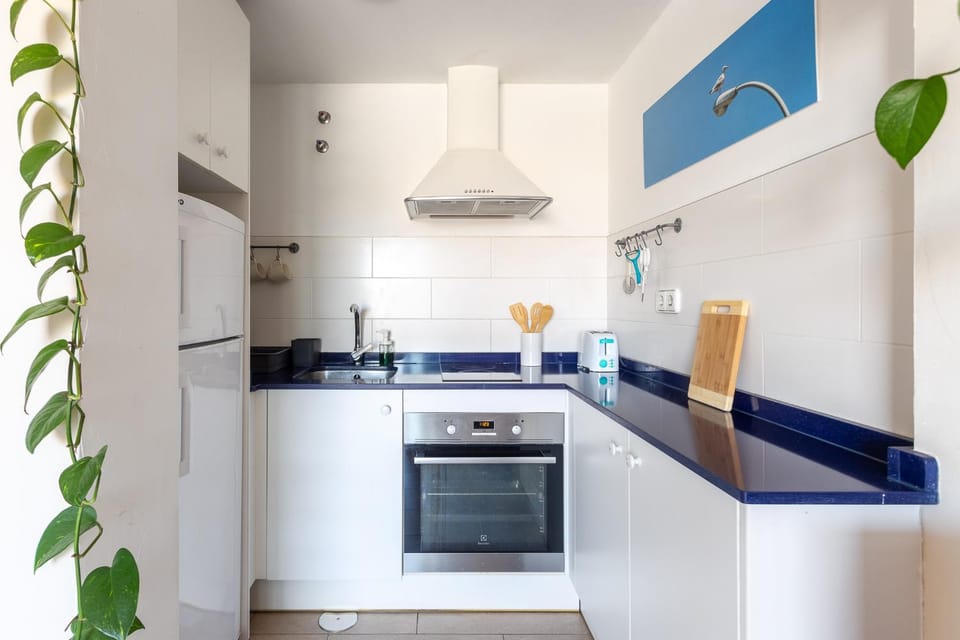 Kitchen or kitchenette, oven, toaster
