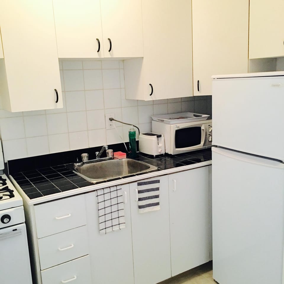 Kitchen or kitchenette, oven, stove, toaster