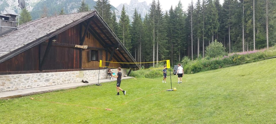 Property building, Natural landscape, Children play ground, group of guests