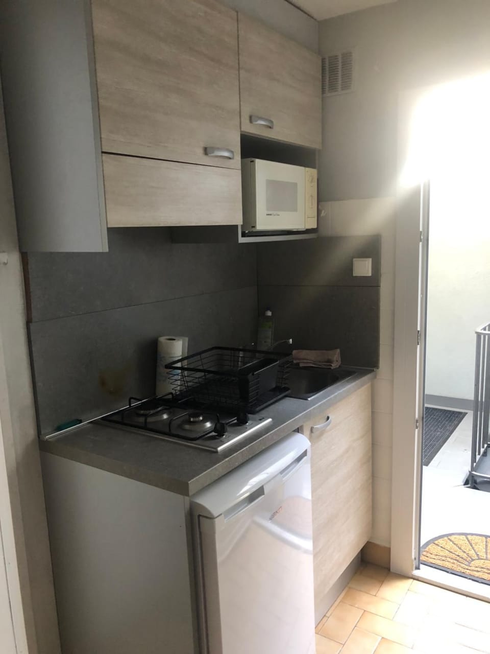 Kitchen or kitchenette, microwave