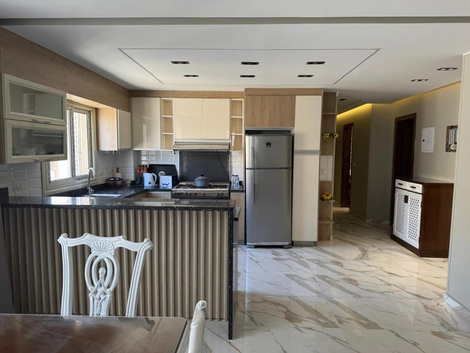 Kitchen or kitchenette, oven