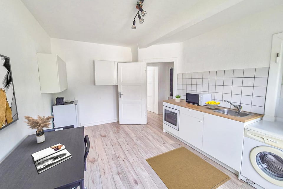 Kitchen or kitchenette, stove, washing machine, kitchen