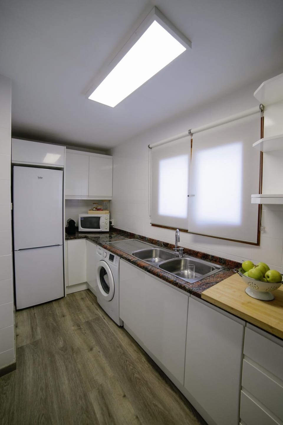 Kitchen or kitchenette, oven, stove, washing machine