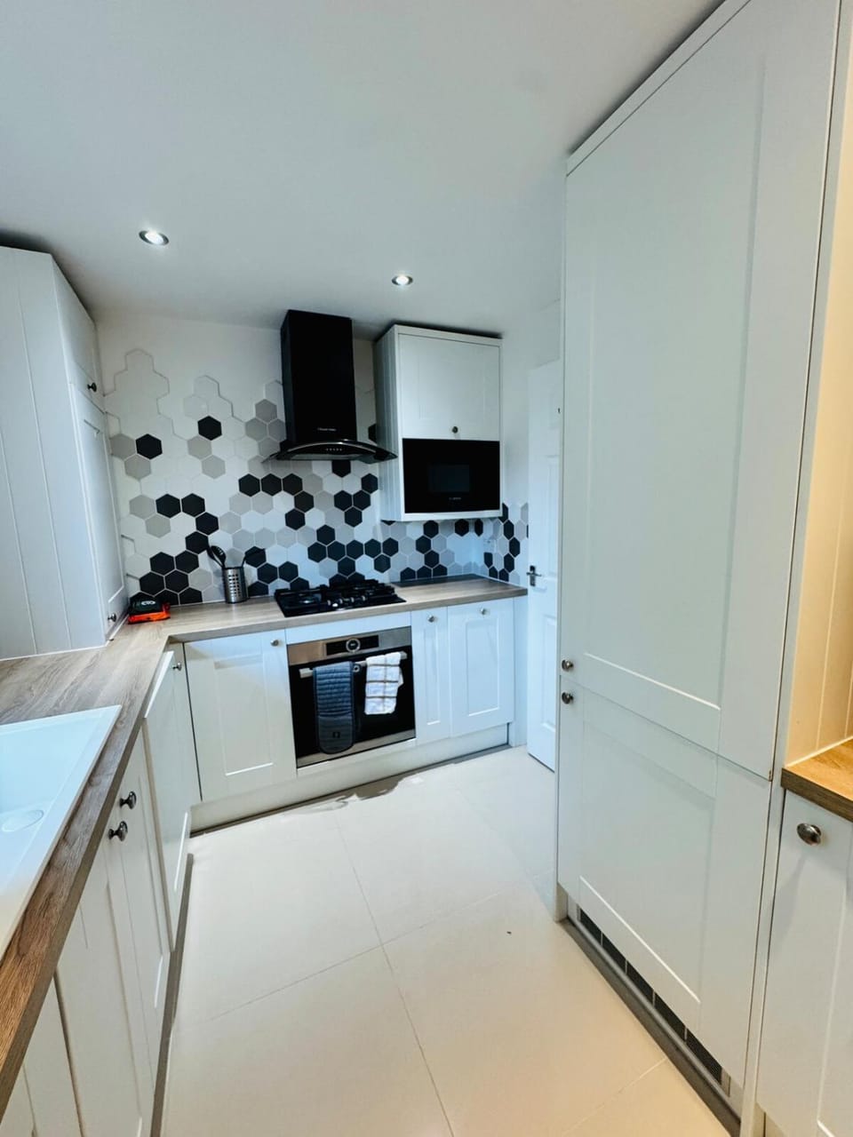 Kitchen or kitchenette, oven, stove
