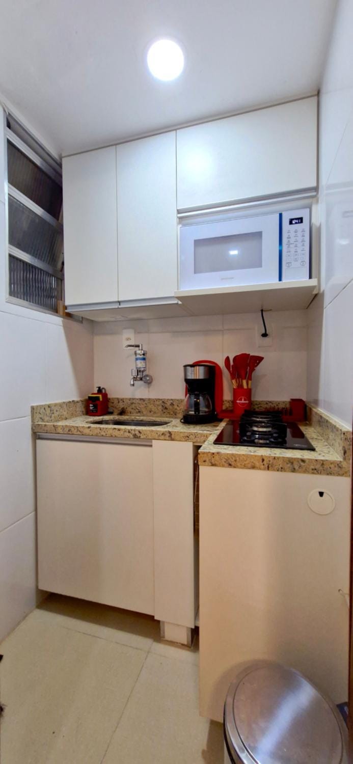 Kitchen or kitchenette, microwave, stove, kitchen