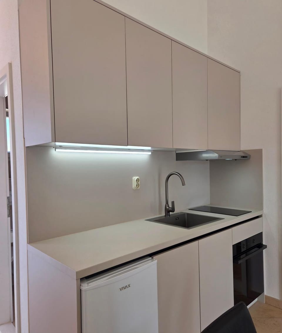 APARTMENTS BRUNO 3 - two-room penthouse apartment - wonderful view of the sea - the best location, first row to the beach - 10 minutes from Supetar ferry port - free secured parking - facilities nearby Apartment in Split-Dalmatia County