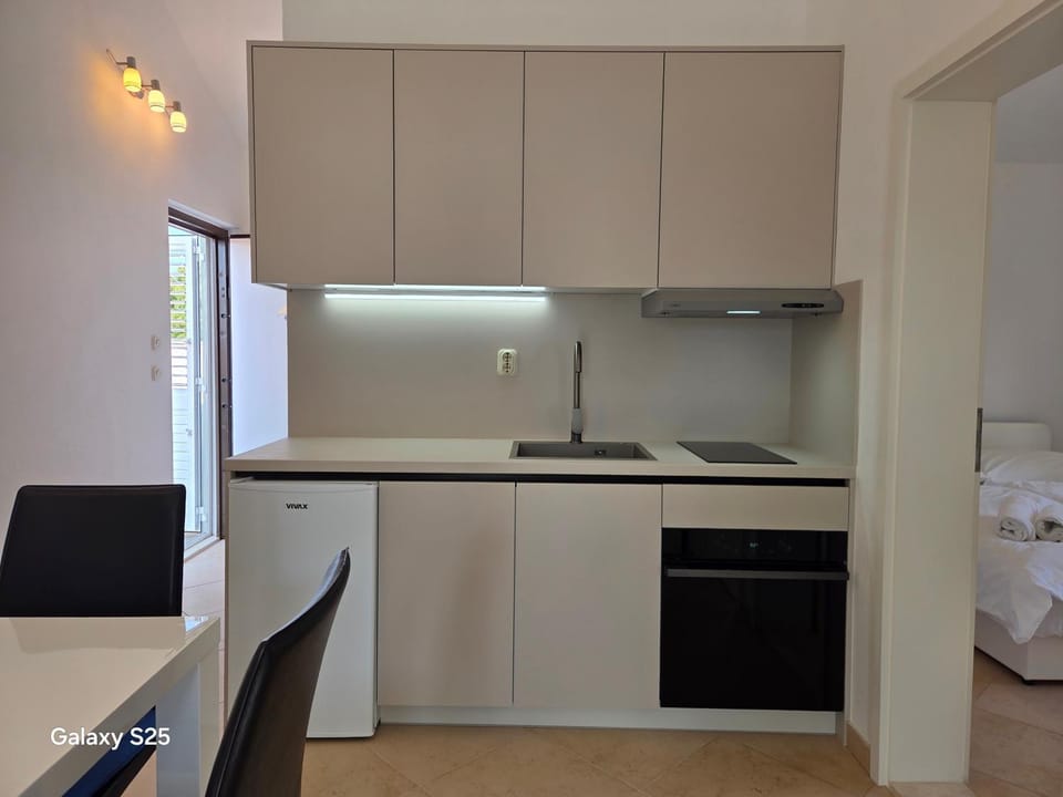 APARTMENTS BRUNO 3 - two-room penthouse apartment - wonderful view of the sea - the best location, first row to the beach - 10 minutes from Supetar ferry port - free secured parking - facilities nearby Apartment in Split-Dalmatia County
