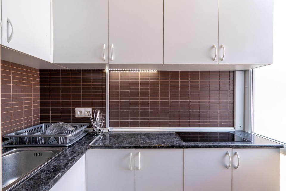 Kitchen or kitchenette, stove