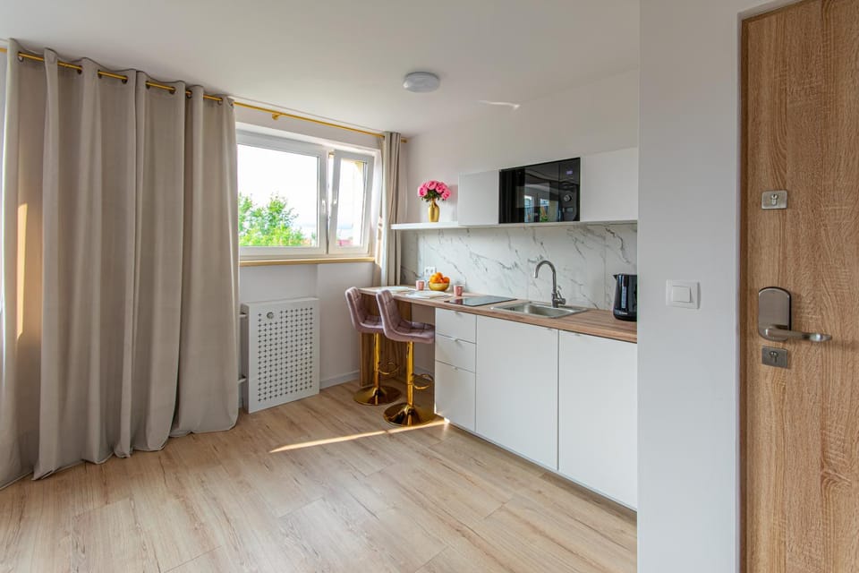 Kitchen or kitchenette, microwave, oven, stove, kitchen