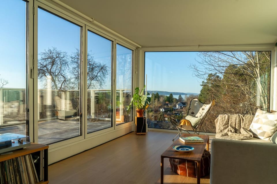 View (from property/room), Living room, Seating area, City view, Sea view