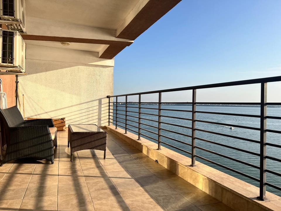 Patio, Day, Balcony/Terrace, Lake view