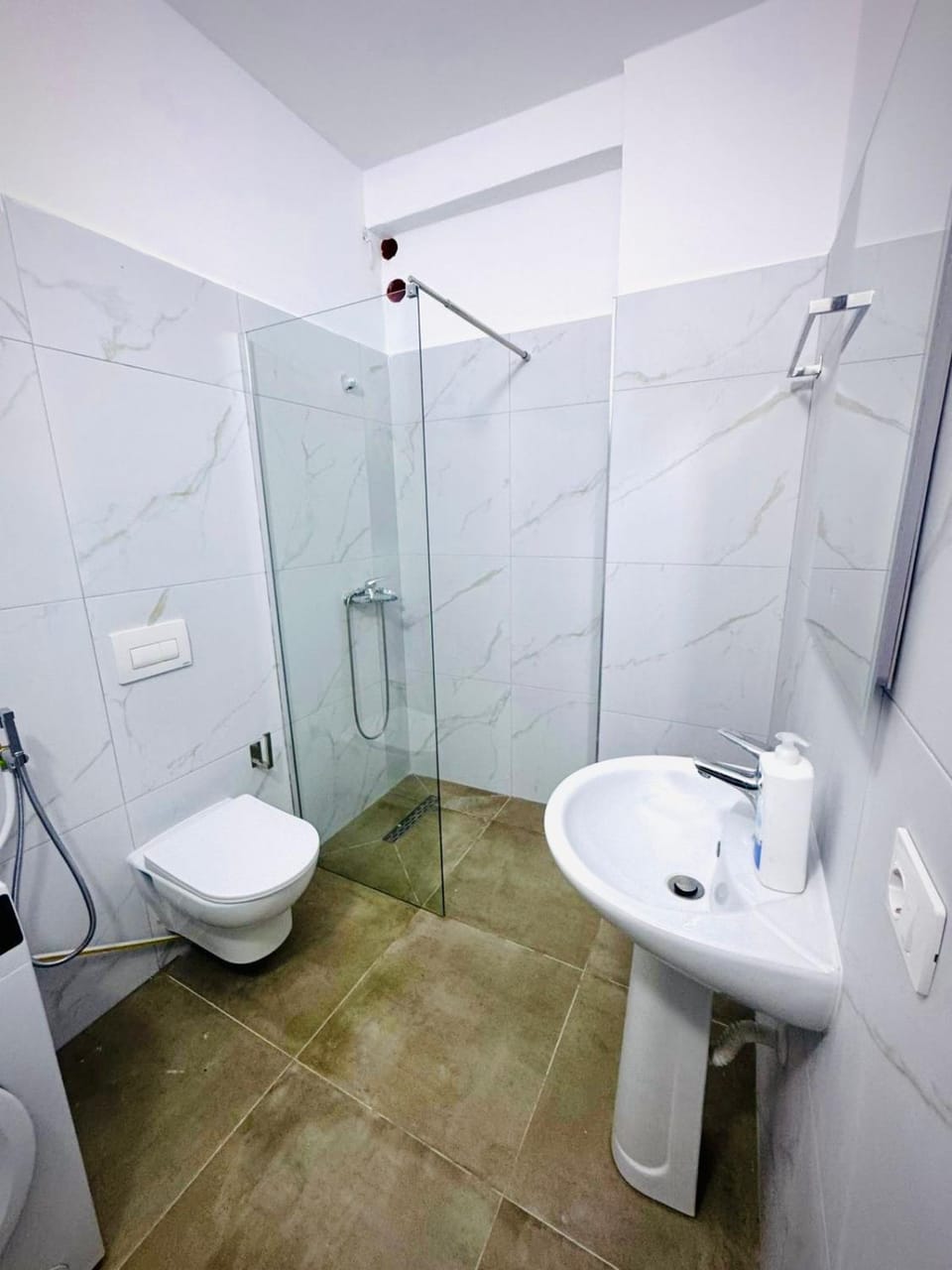 Shower, Toilet, bidet, towels