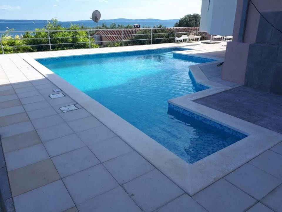 Sea view apartment with swimming pool near beach Apartment in Split