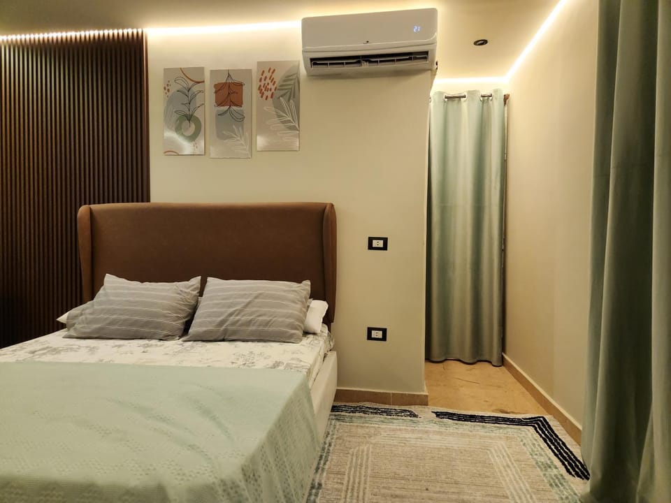 Bed, air conditioner