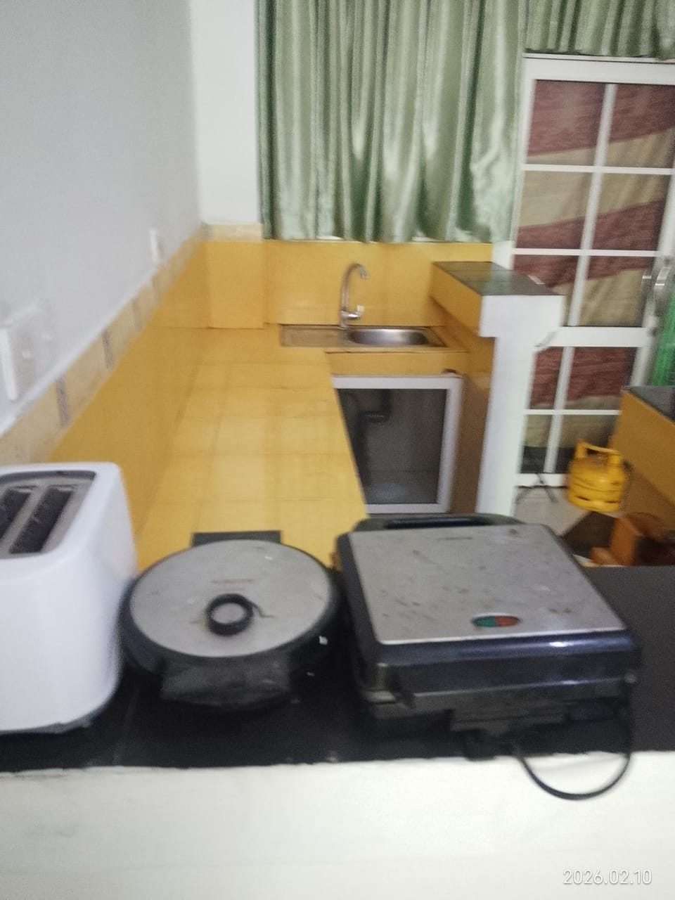 Kitchen or kitchenette, toaster
