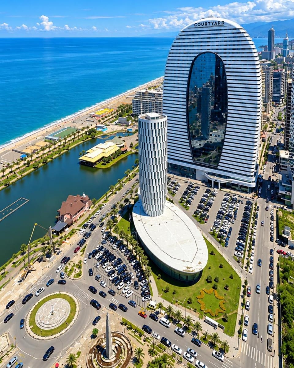 Property building, Nearby landmark, Day, Neighbourhood, Natural landscape, Bird's eye view, Beach, City view, Sea view, Location, Parking