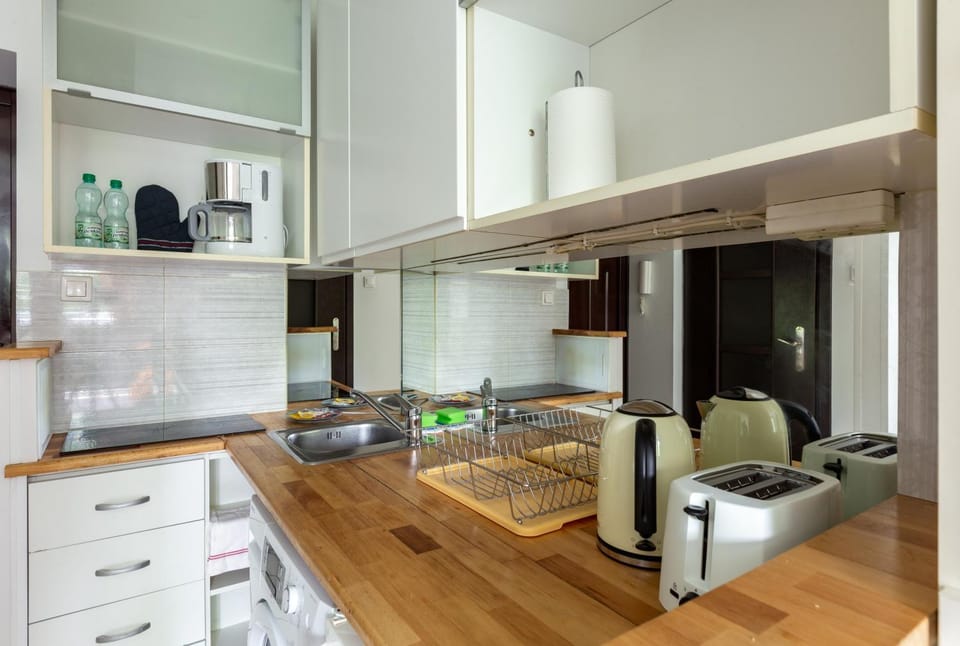 Kitchen or kitchenette, oven, stove