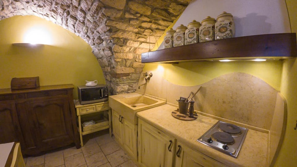 Kitchen or kitchenette, stove