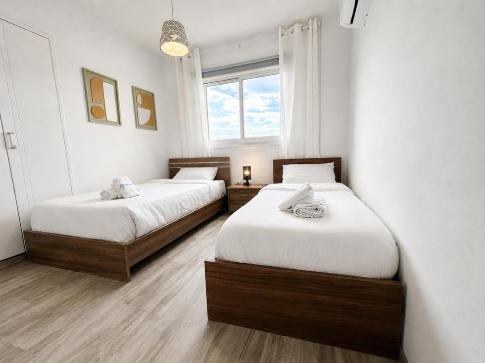 Bed, Photo of the whole room, Bedroom, towels, air conditioner