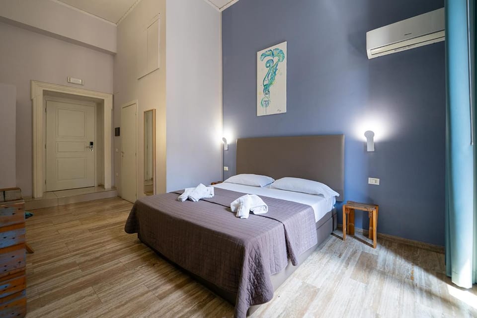 Bed, Photo of the whole room, Bedroom, towels, air conditioner
