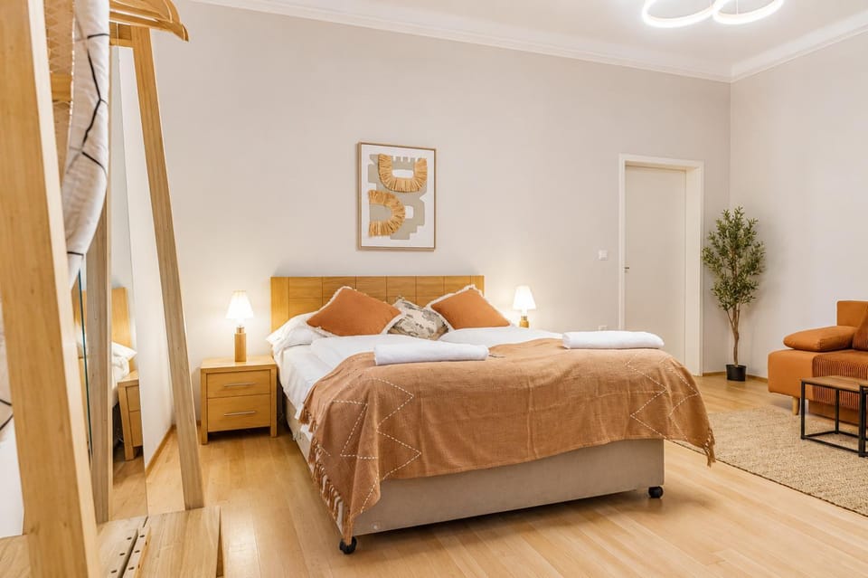 Bed, Living room, Seating area, Bedroom