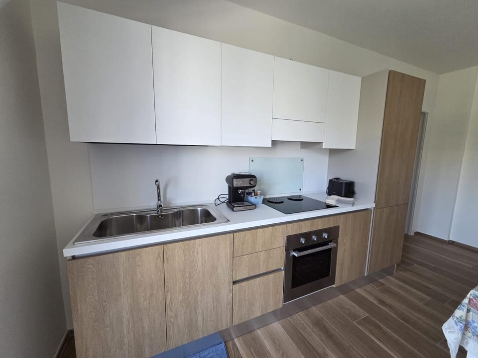 Kitchen or kitchenette, oven, stove