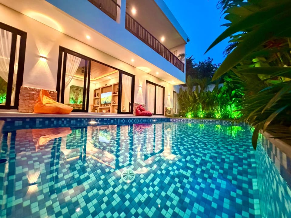 Property building, Patio, Night, Pool view, Swimming pool, sunbed