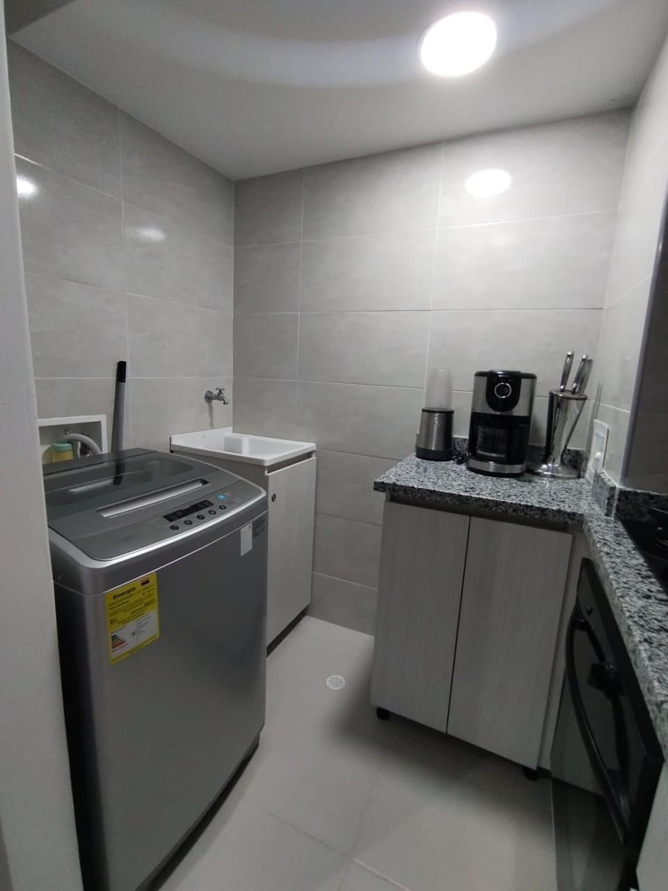 Kitchen or kitchenette, laundry