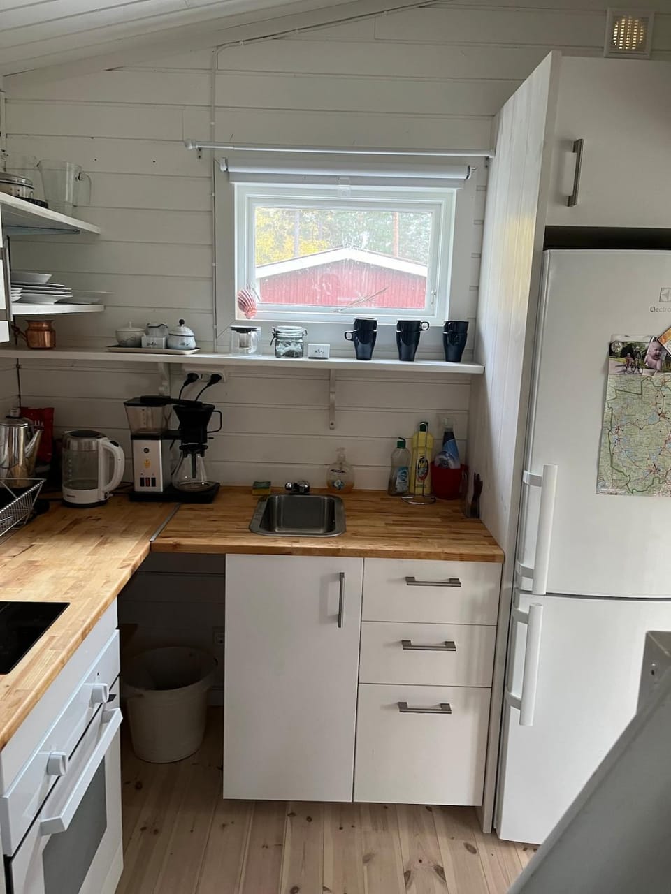 A simple stuga on a lake incinerating toilet in a separate building next to the cabin Water for drinking and washing hands dishes comes from two containers that attach to a faucet through a simple electric pump OBS no shower on site Cabin in Sweden