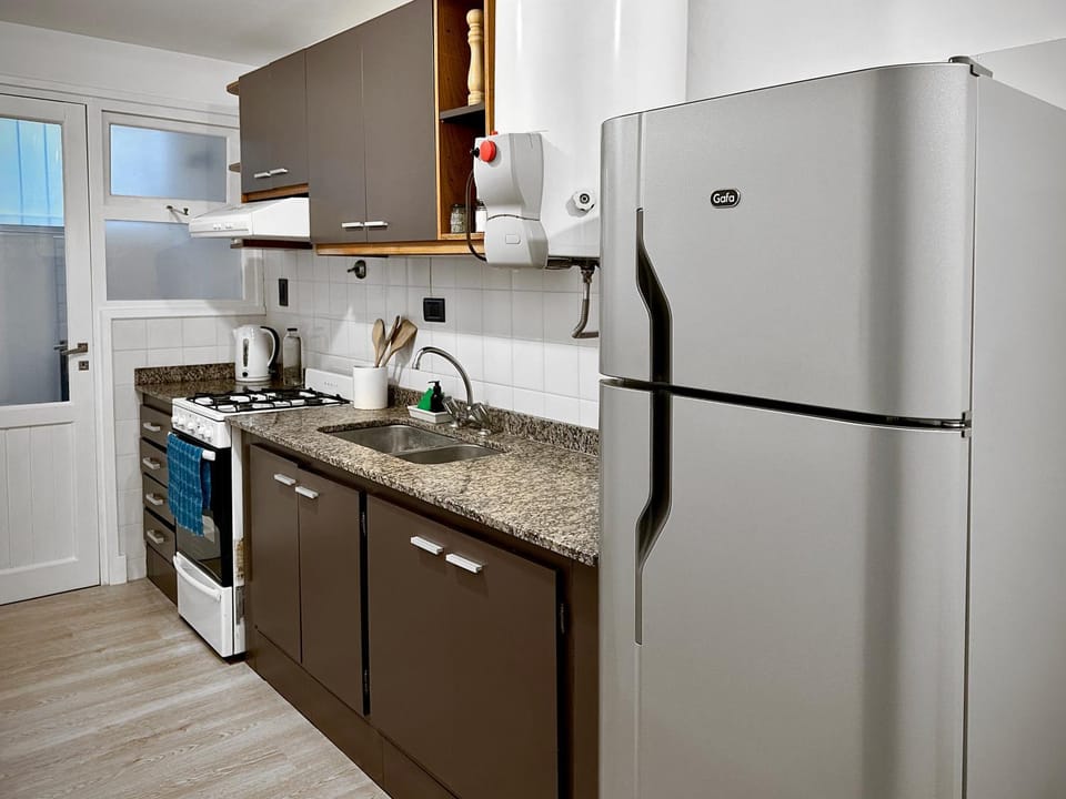 Kitchen or kitchenette, oven, stove