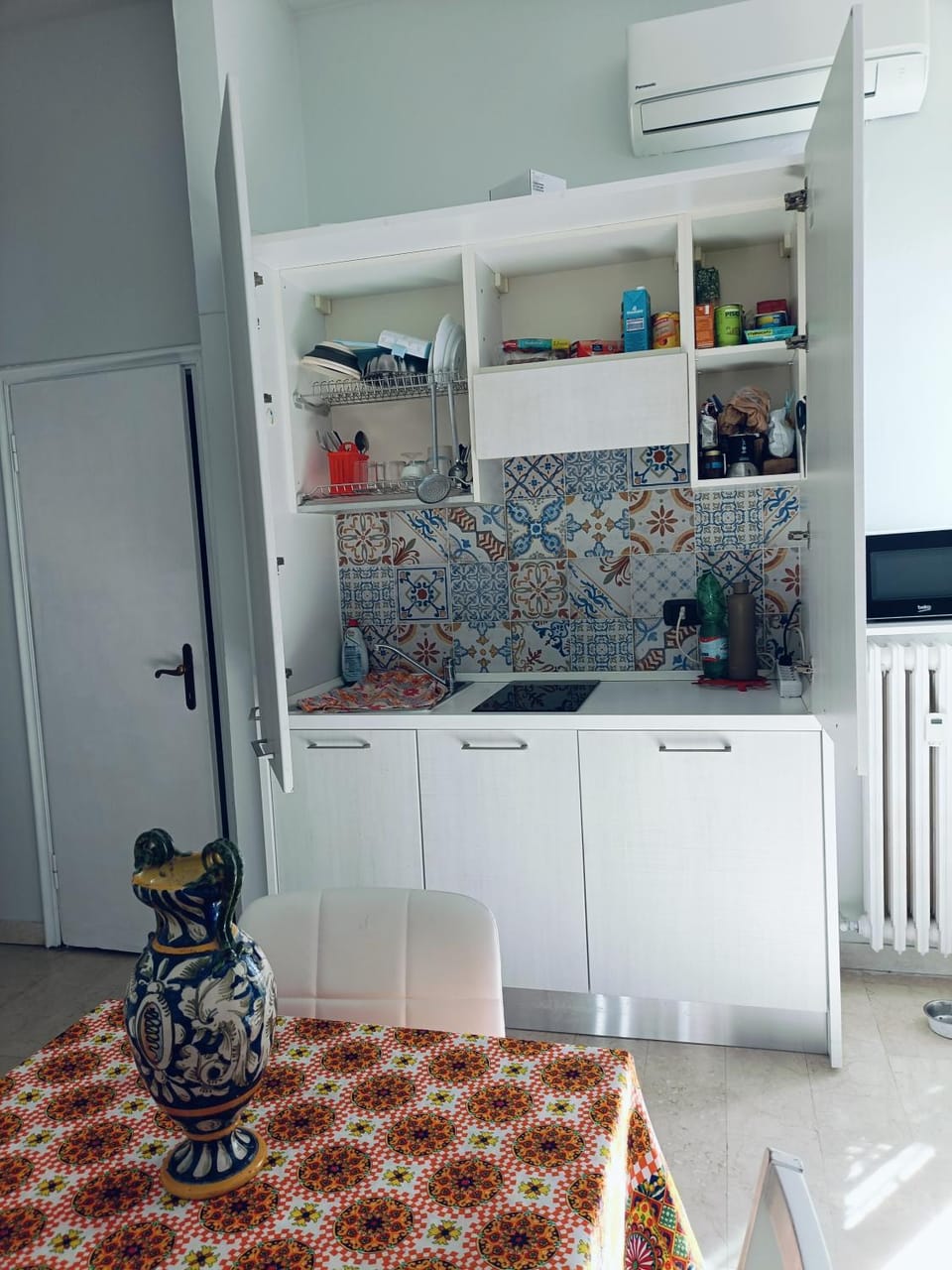 Kitchen or kitchenette, stove