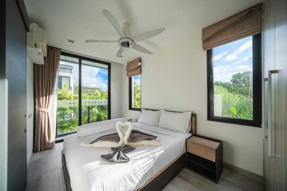 Modern minimalist style luxury villa with private pool located in a high-end resort area adjacent to Laguna Park Golf Course Villa in Choeng Thale