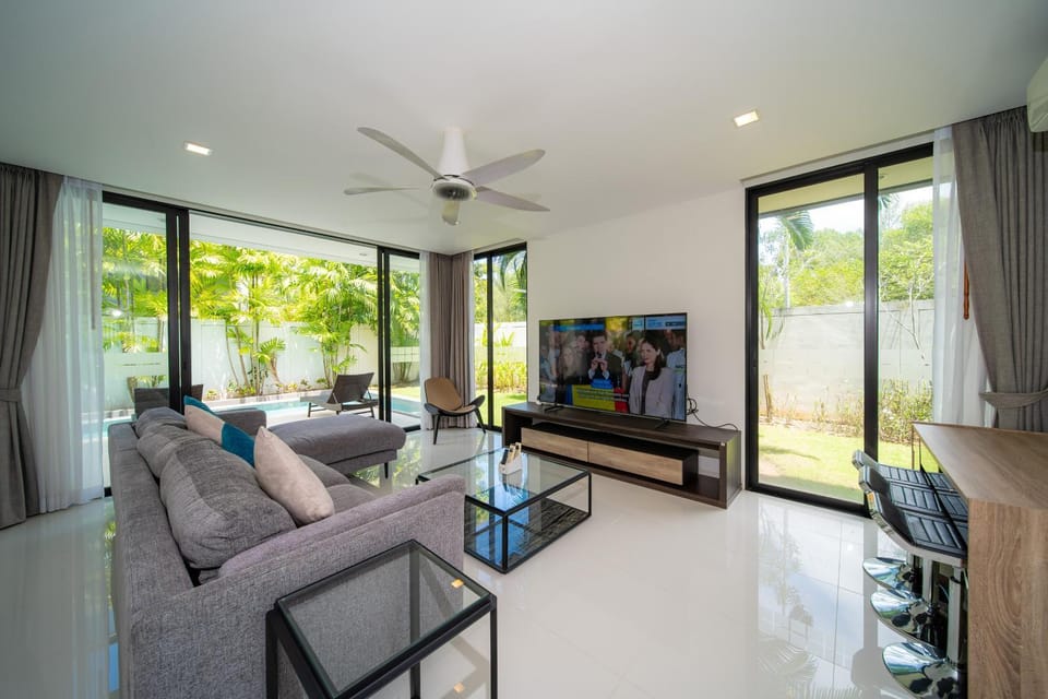Modern minimalist style luxury villa with private pool located in a high-end resort area adjacent to Laguna Park Golf Course Villa in Choeng Thale