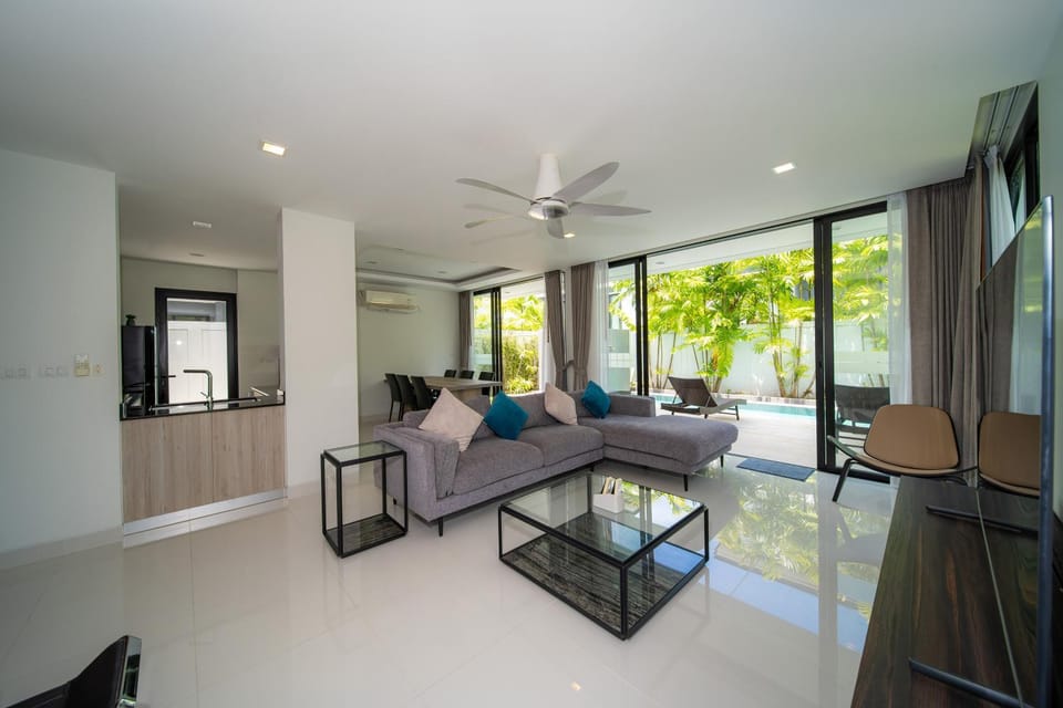 Modern minimalist style luxury villa with private pool located in a high-end resort area adjacent to Laguna Park Golf Course Villa in Choeng Thale