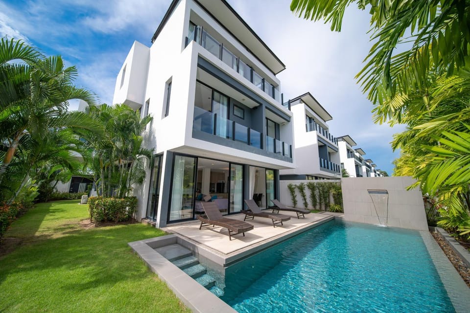 Modern minimalist style luxury villa with private pool located in a high-end resort area adjacent to Laguna Park Golf Course Villa in Choeng Thale