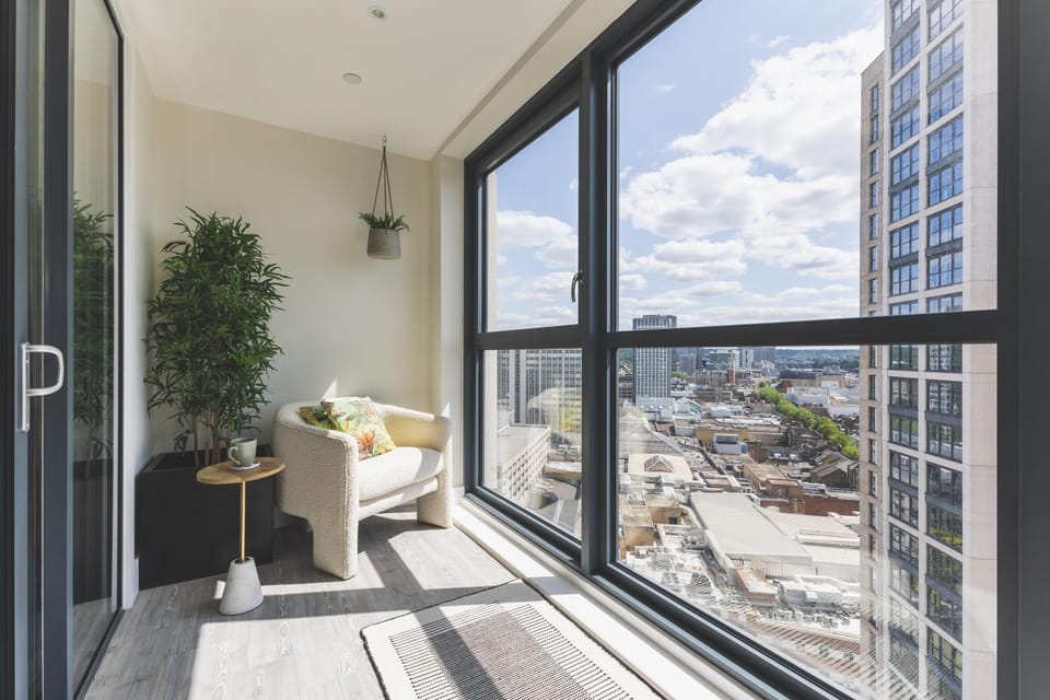 Property building, Day, Living room, Seating area, City view